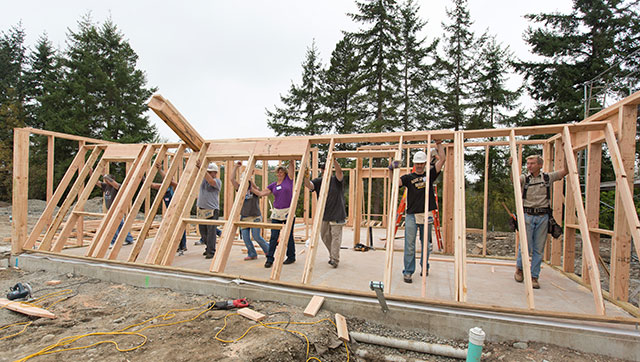 Wall-raising of the Habitat for Humanity home for Dianna and David Sullivan sponsored by PLU and Thrivent Financial on Saturday, Sept. 14, 2013. Dianna Sullivan is a graduate student studying Marriage and Family Therapy. (Photo/John Froschauer)