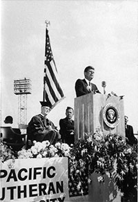 President John F. Kennedy makes an address at the joint PLU/UPS Convocation on Sept. 27, 1963 at Cheney Stadium in Tacoma. (Photo courtesy of PLU Archives)