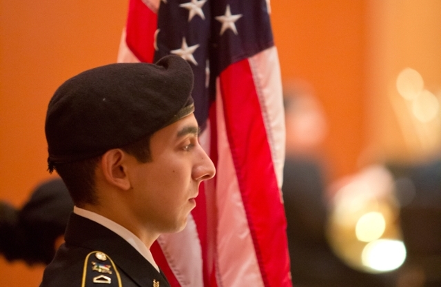 Student standing at attention