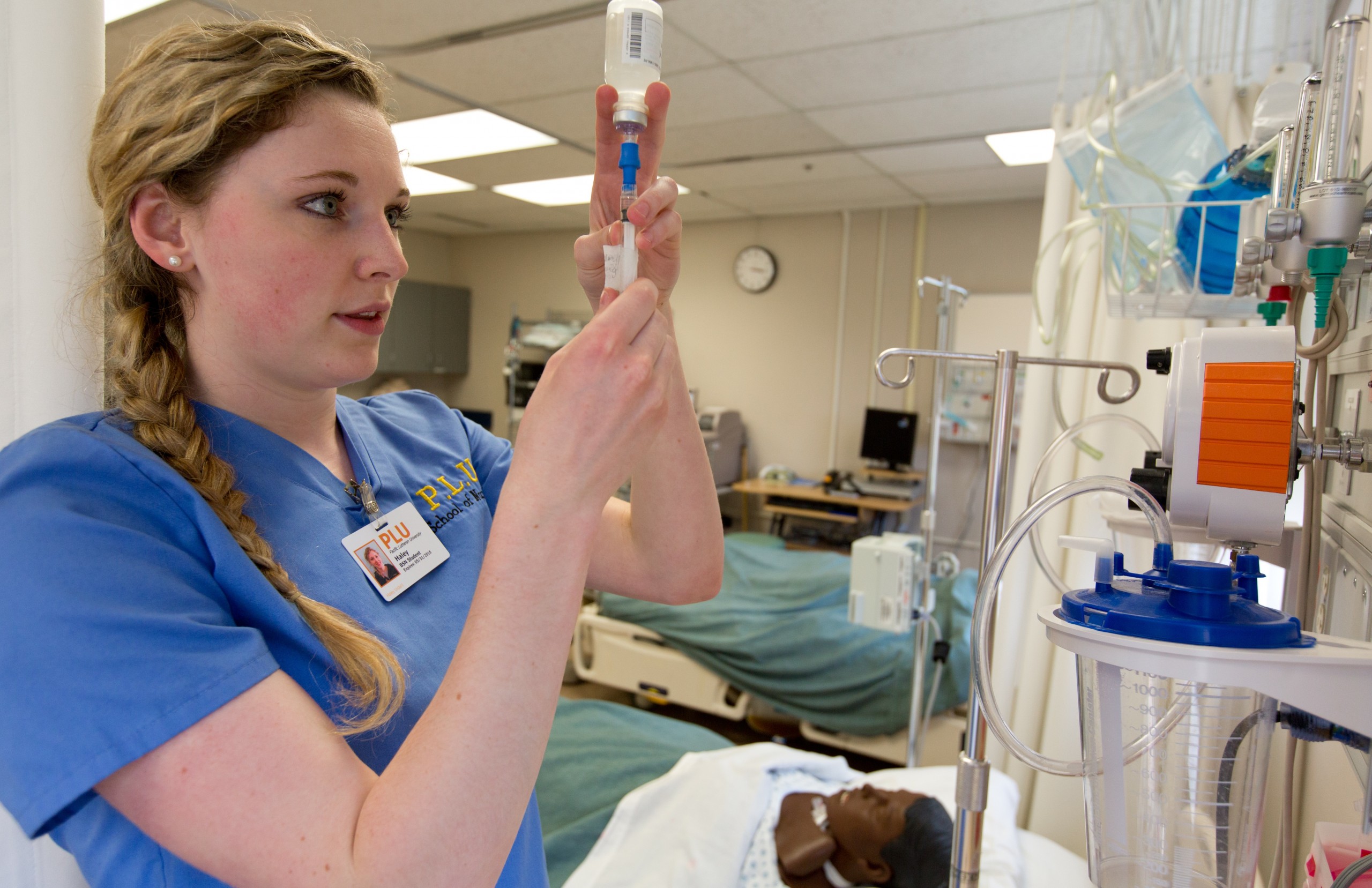 PLU Nursing student Haley Urdahl ’15 works in the Ramstad lab. (Photo: John Froschauer / PLU)