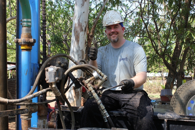 Professor Mark Mulder works at a well during one of his recent visits to Central America. (Photo courtesy of Mark Mulder.)