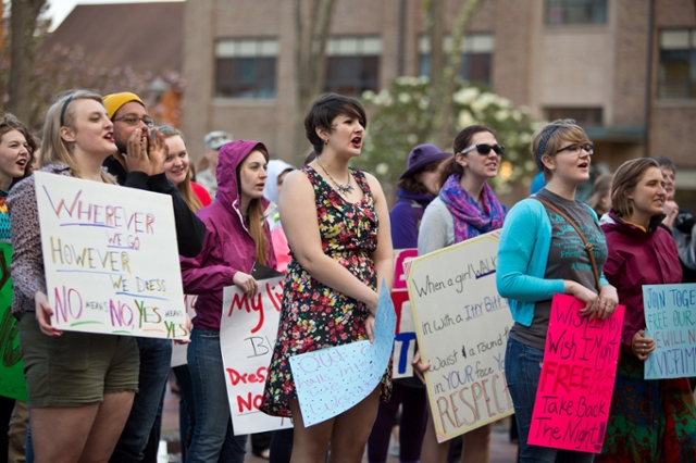 Crowd gathers for Take Back the Night event at Red Square. The annual event is part of an international campaign to raise awareness against sexual assault. (John Froschauer, Photo).