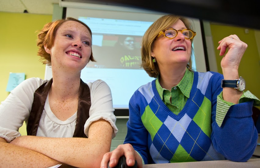 Alison Haywood ’14, left, with Communication Professor Joanne Lisosky. (Photo: John Froschauer/PLU)