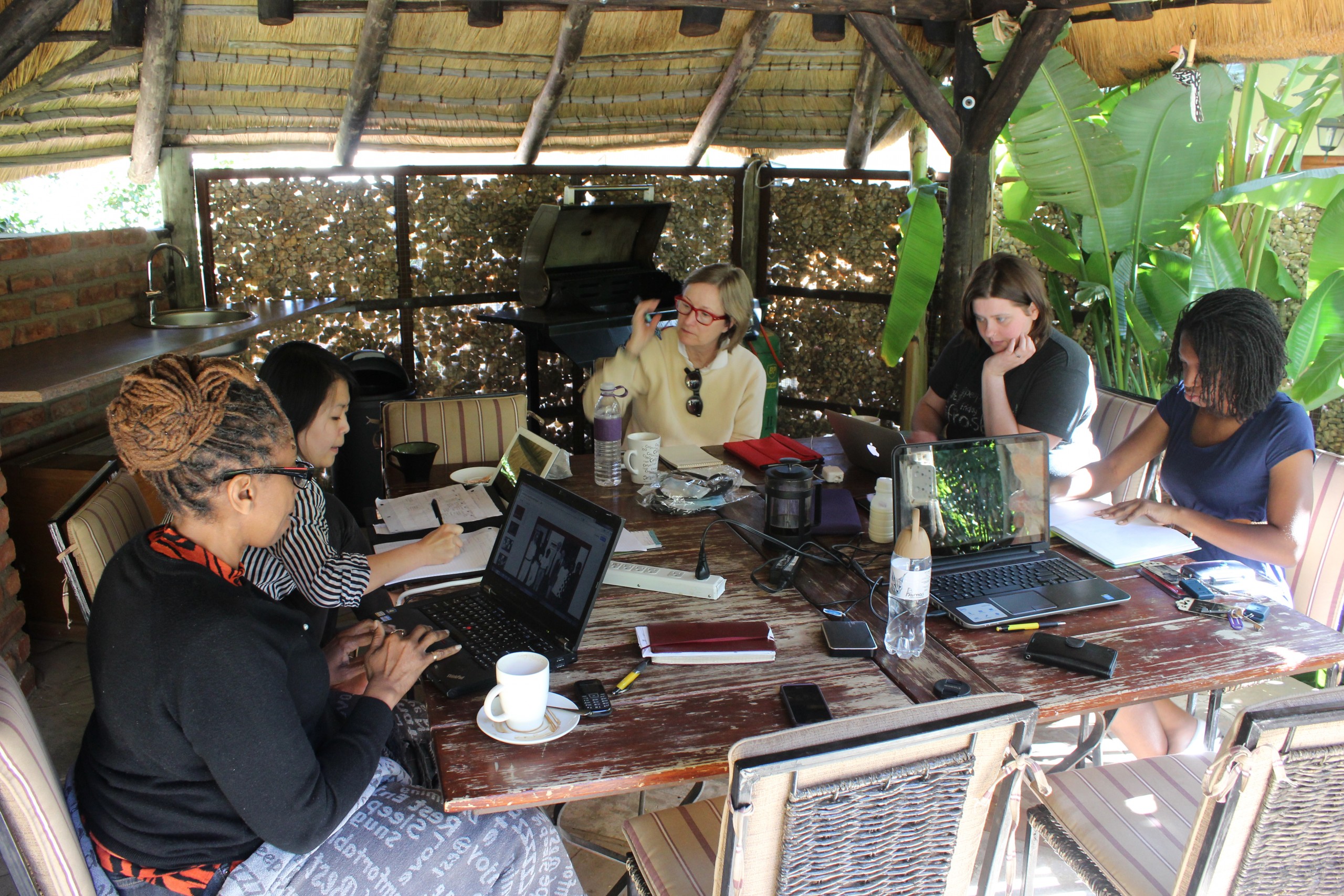 The film crew goes over script development in Namibia. (Photo: Maurice Byrd ’14)