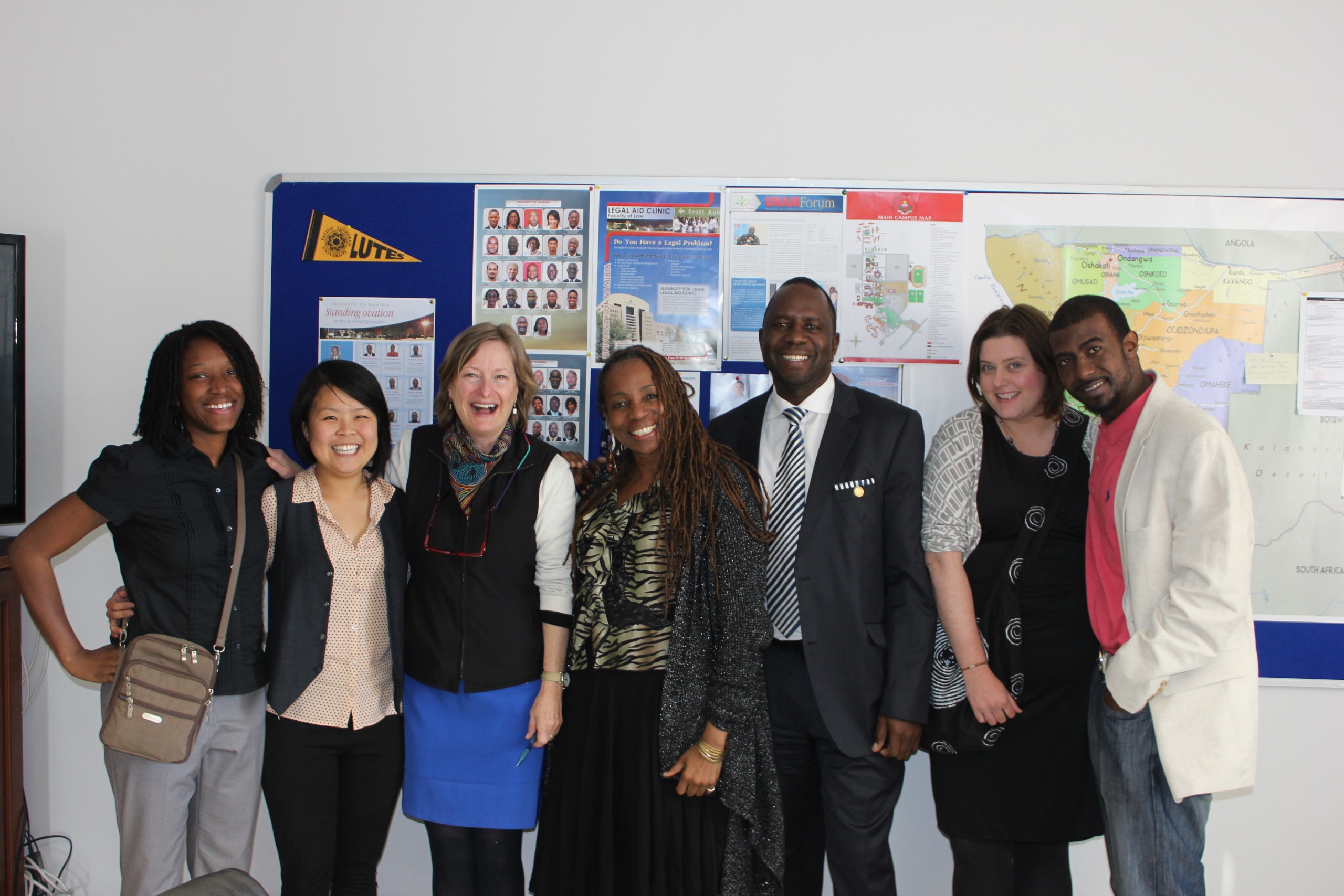 The film crew visited ‘Namibia Nine’ narrator and PLU graduate Edwin Tjiramba, third from right, in his office at the University of Namibia, where he is Director for Communications and Marketing. (Note the PLU flag in the corner of his bulletin board!)