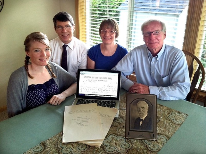 rom left, Carol Yenish of Mankato, Minn., the Beckers’ daughter and great-great-grandchild of PLU founder Bjug Harstad; Vance and Linda (Harstad) Becker of North Mankato; and Mark Harstad of Mankato display electronic and typed records of their ancestor’s journey to Yukon Territory in search of gold.
(Photo: Amanda Dyslin/courtesy of The Free Press of Mankato)
