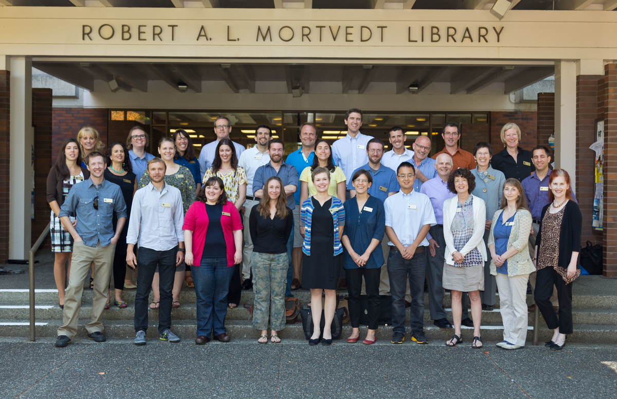 The newest members of PLU’s faculty gather in front of the library. (Photo: John Froschauer/PLU) 2014