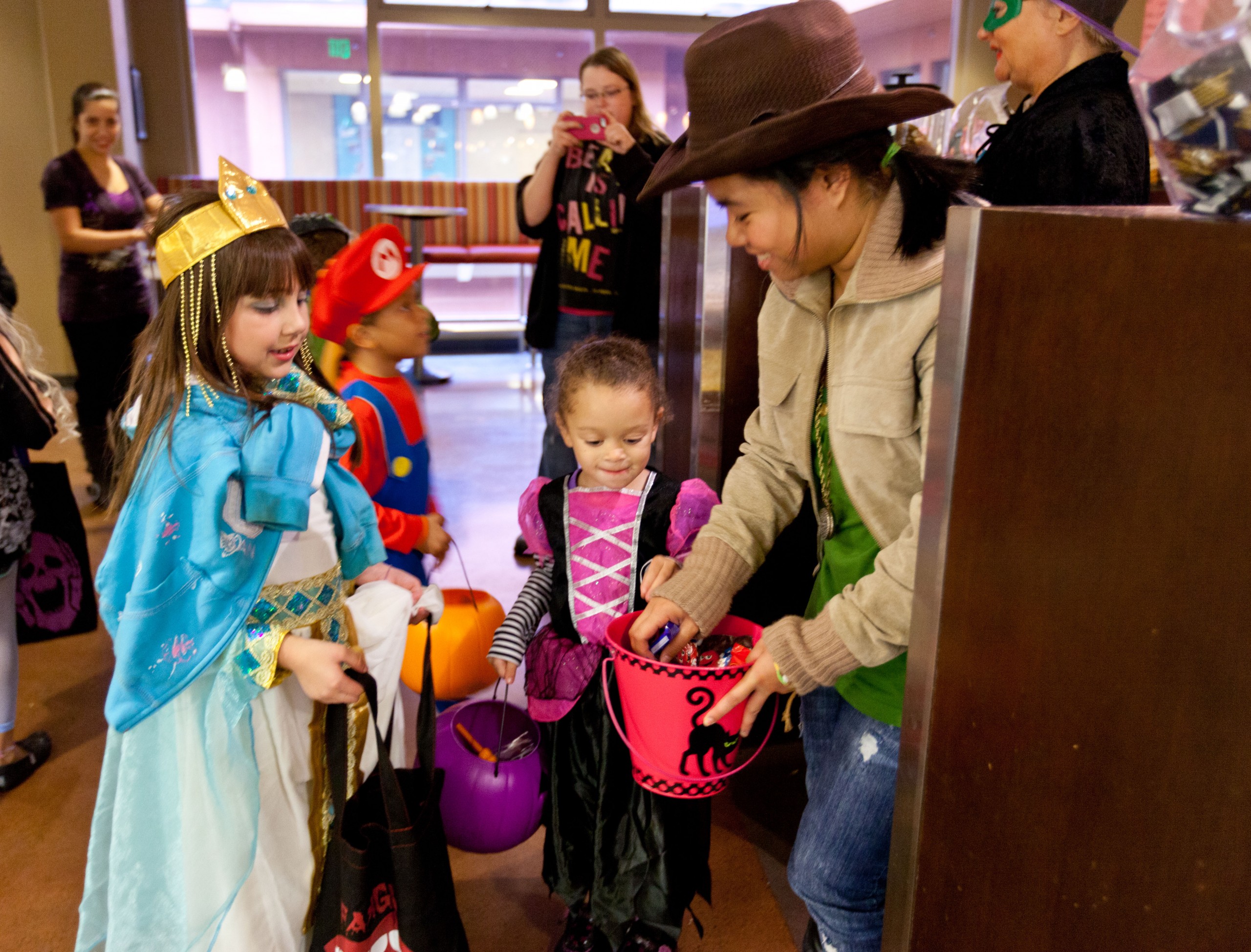 Children trick or treat at PLU in 2012; it’s a tradition that goes back nearly a dozen years. (Photo: John Froschauer/PLU)