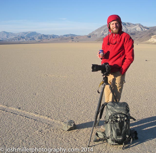 Photographer Josh Miller '01 stands with a camera in Death Valley. (Photo courtesy of Josh Miller)
