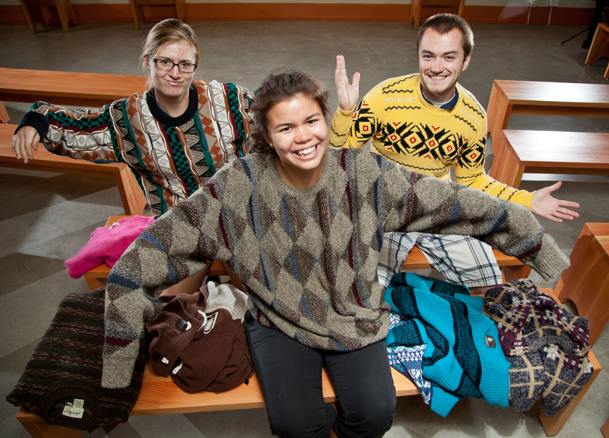 October’s Sweater Swap was designed to encourage the PLU community to bundle up to save energy. (Photo: John Froschauer/PLU) Students wearing sweaters.