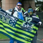 Seattle Seahawks events set up and staged by 2014 MBA graduate Stephen Dilts’ company, Pyramid Staging & Events, LLC. (Photos courtesy John Patzer Photography. Two Seahawk fans painted up holding LOB flag