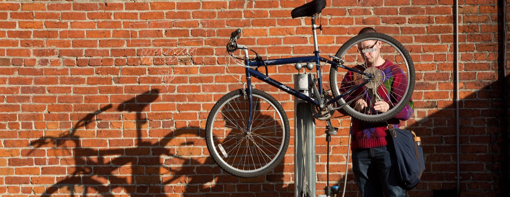 Student working on bicycle