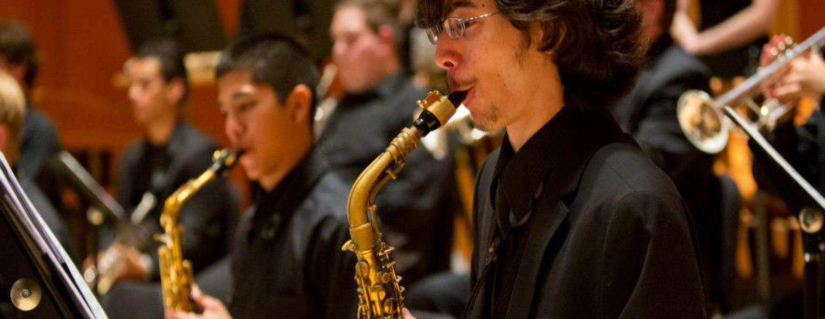 Students playing the saxophone.