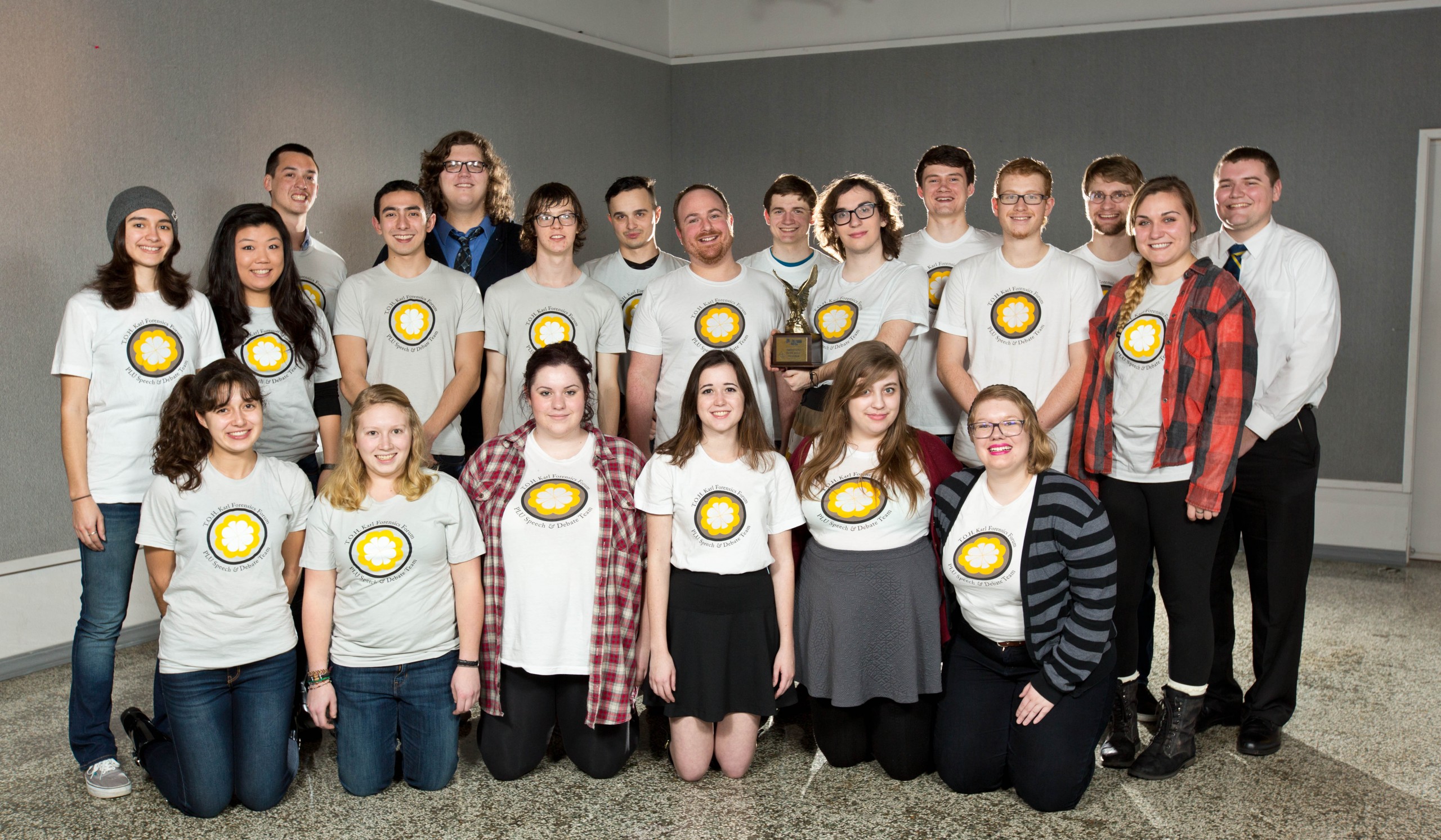 Members of PLU's Speech and Debate team pose with the sweepstakes award honoring the team's 2014-15 season. (Photo: John Froschauer/PLU)