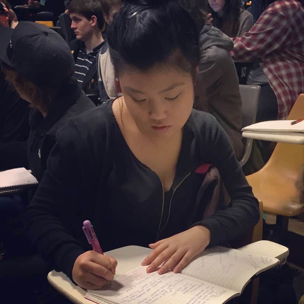 Patricia Im, preparing for a round of debate. (Photo: Tori Vigil/PLU)