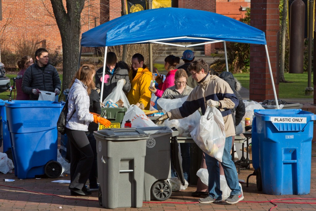 Garbology, students sorting through a day of trash for recyclamania at PLU on Friday, Feb. 14, 2014. (Photo/John Froschauer)