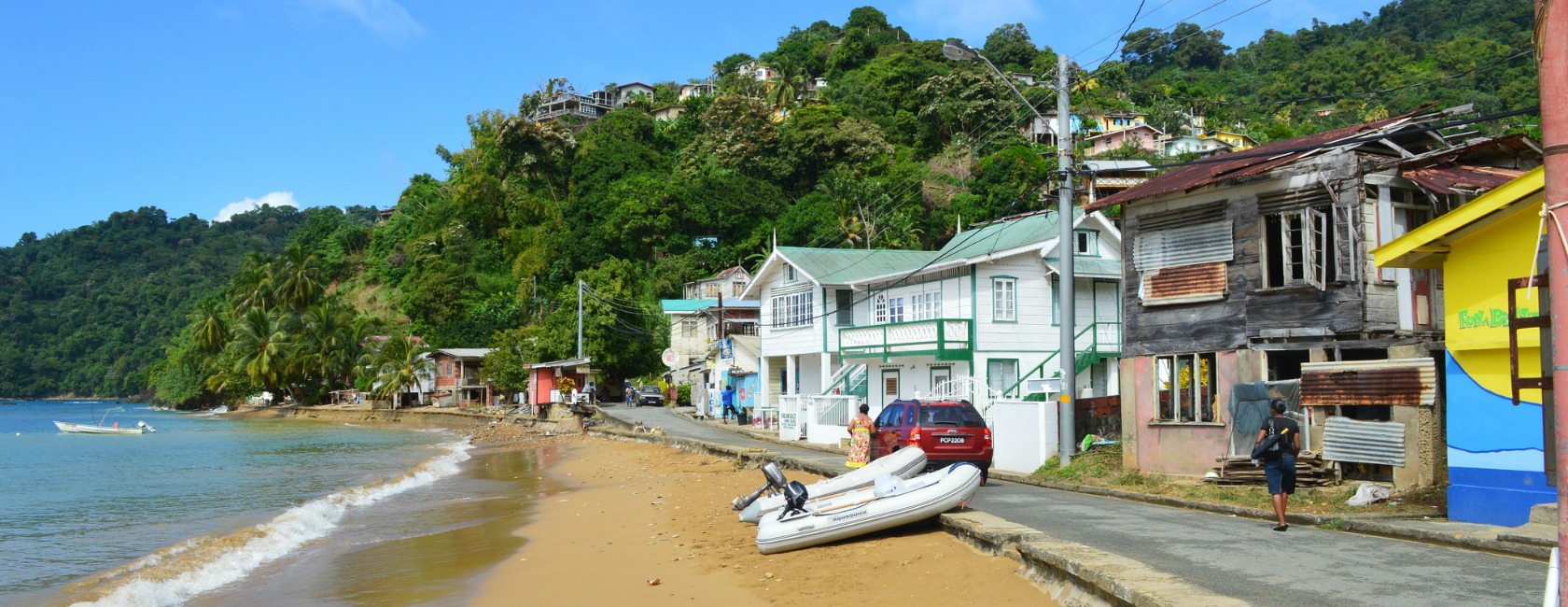 Island beach with houses along narrow road