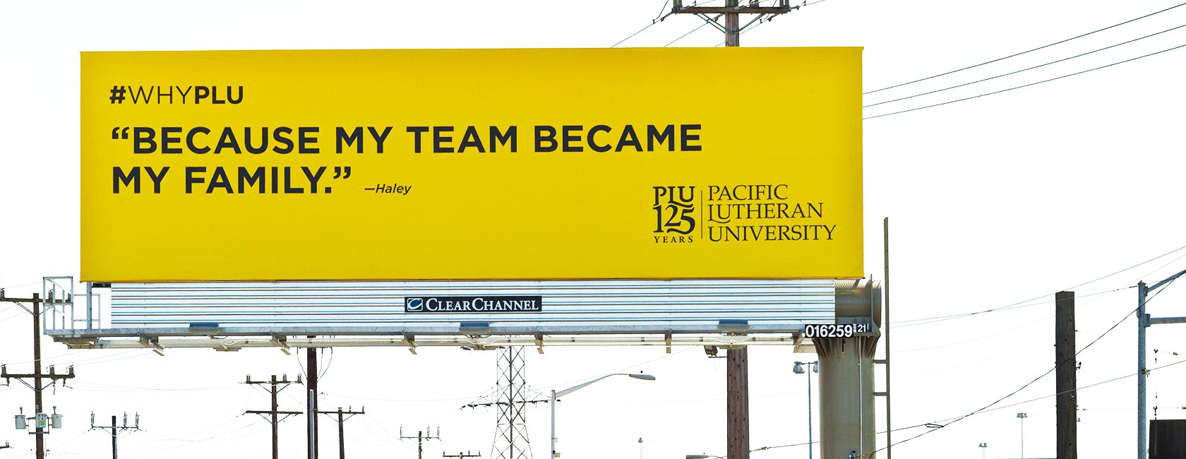 “Because My Team Became My Family” is one of two #whyPLU billboards in Seattle’s “sports zone”—this one at First Avenue and East Marginal Way. (Photo: John Froschauer/PLU)