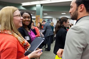 Elementary Education major Danay Jones ’15, second from left, attended the Education Career Fair and then signed a letter of intent with her top choice, Tacoma Public Schools. (Photo: John Froschauer/PLU)