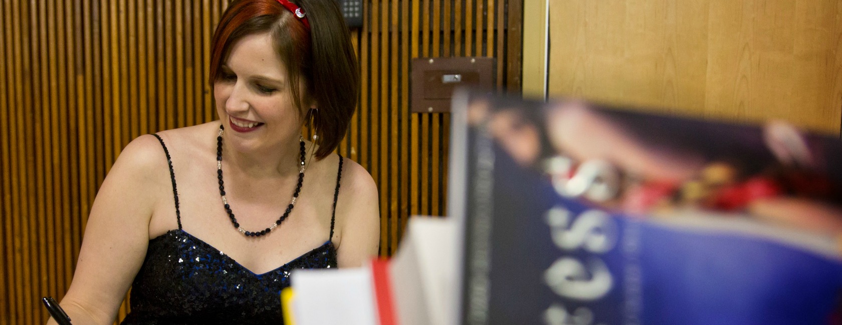 Marissa Meyer signs a book at the launch party of "Cress" at PLU on Feb. 4, 2014. (Photo: John Froschauer/PLU)