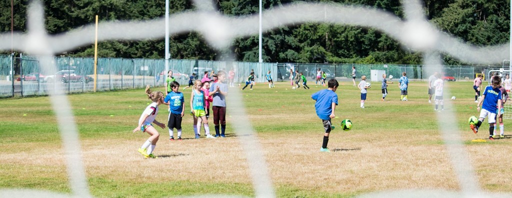 Colleen Hacker's Success Soccer Camp, young people playing soccer.