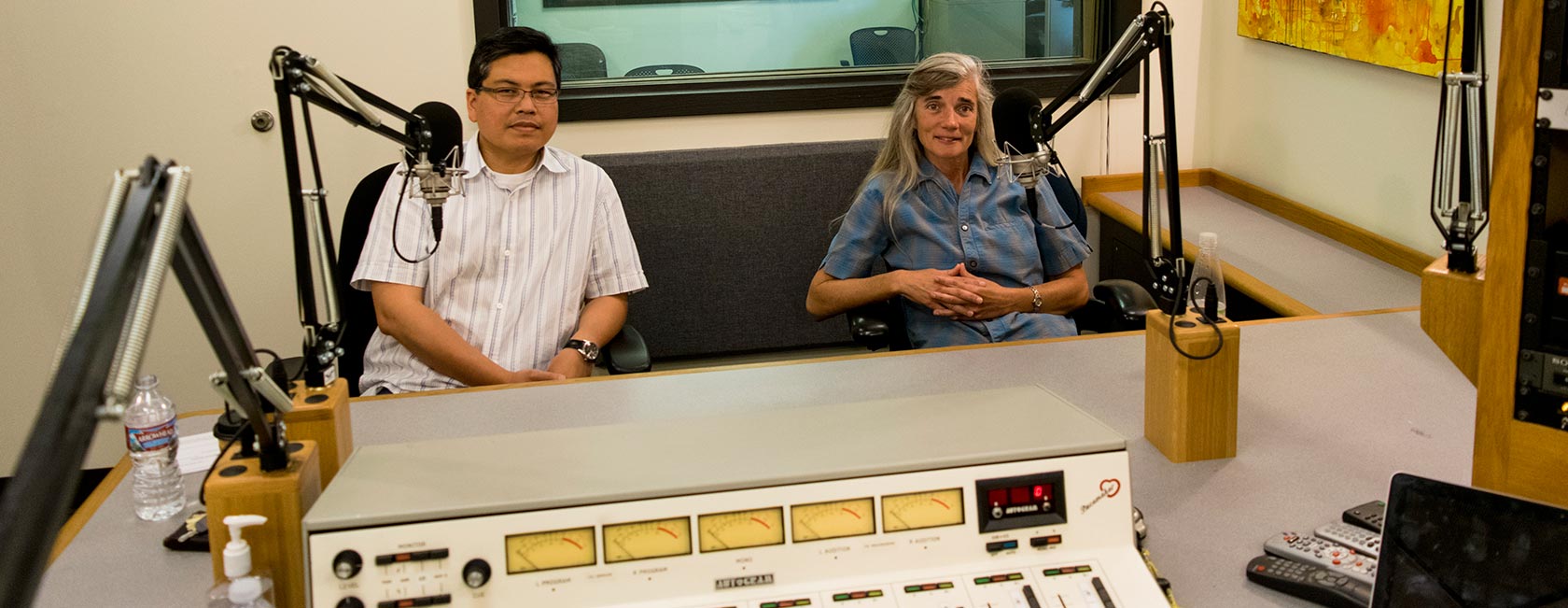 MFA Director Rick Barot and MFA Mentor & Instructor Ann Pancake at KPLU's recording studio in downtown Seattle. [Photo by Zach Powers/PLU]