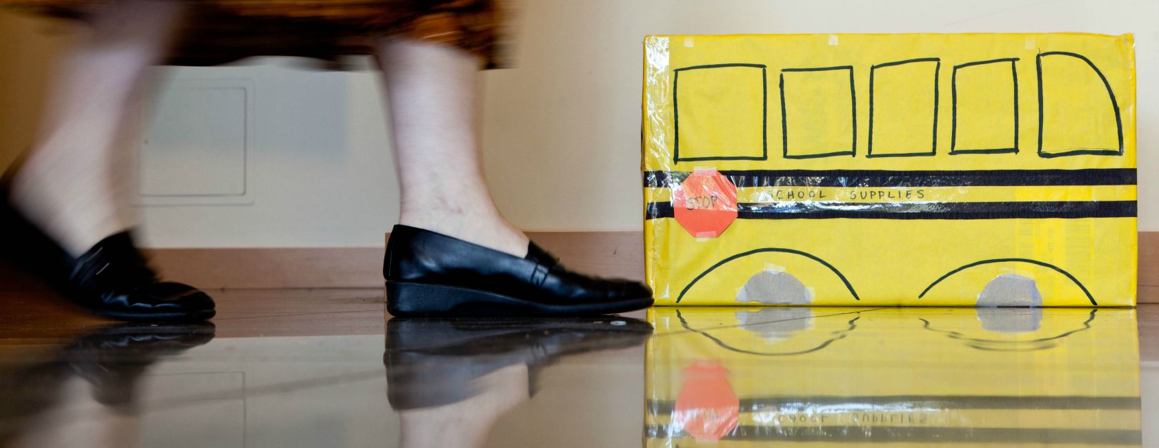 The Stuff the Bus donation drive is underway at PLU. (Photo: John Froschauer/PLU) Photo of a cardboard box that looks like a school bus.