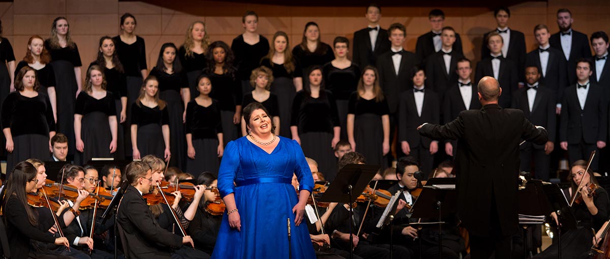 Award-winning Opera soprano Angela Meade ’01 (center in blue) at PLU’s 125th Anniversary Gala Concert on Friday, Dec. 11 in Lagerquist Concert Hall. (Photo by PLU/John Froschauer)