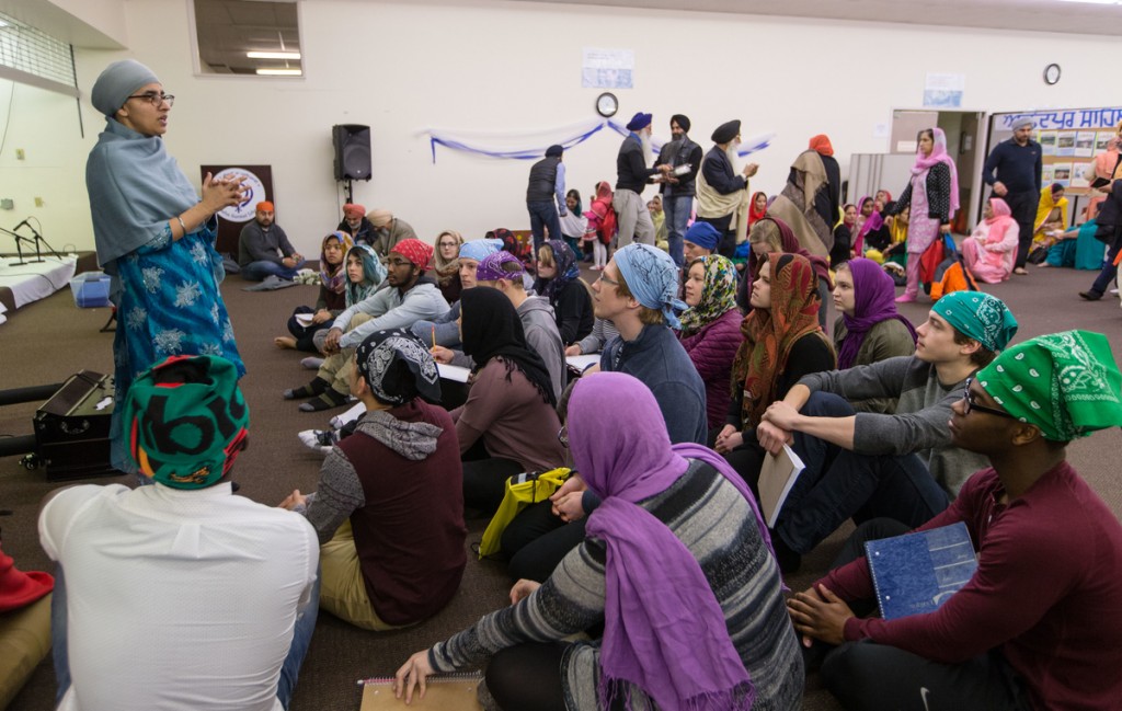 Amardip Kaur, Sikh community member and teacher, leads the Religion 230 class through a question and answer session.