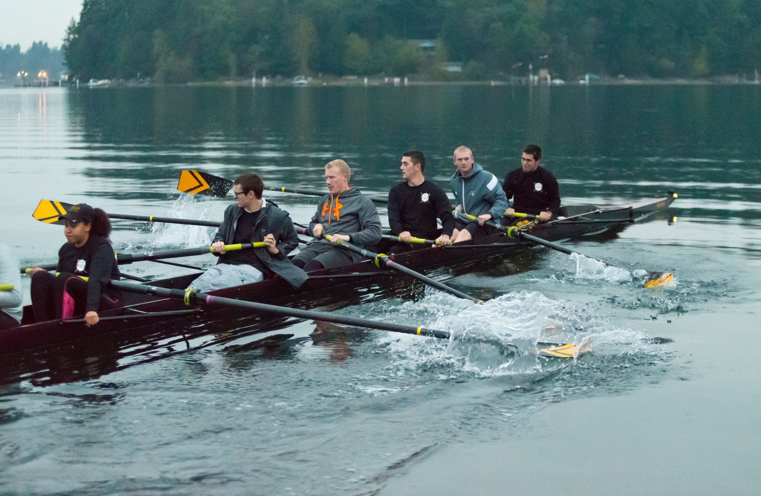 Men's basketball team joins the women's crew team to learn and experience a workout at American Lake on Wednesday, Oct. 7, 2015. (Photo/John Froschauer)