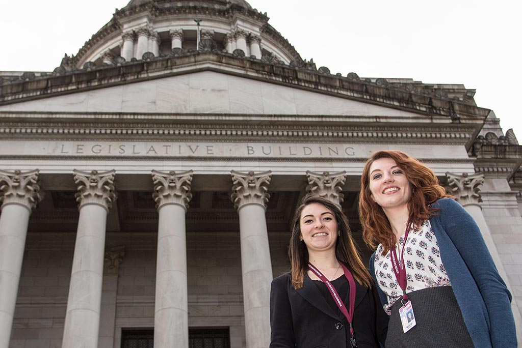 PLU students and legislative interns Savannah Turner '16 and Kacie Masten '17 outside the Washington State Capitol in Olympia. (All Photos by John Froschauer/PLU)
