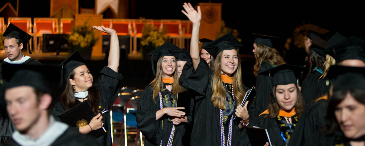Graduates celebrate following PLU's 2015 Commencement ceremony.