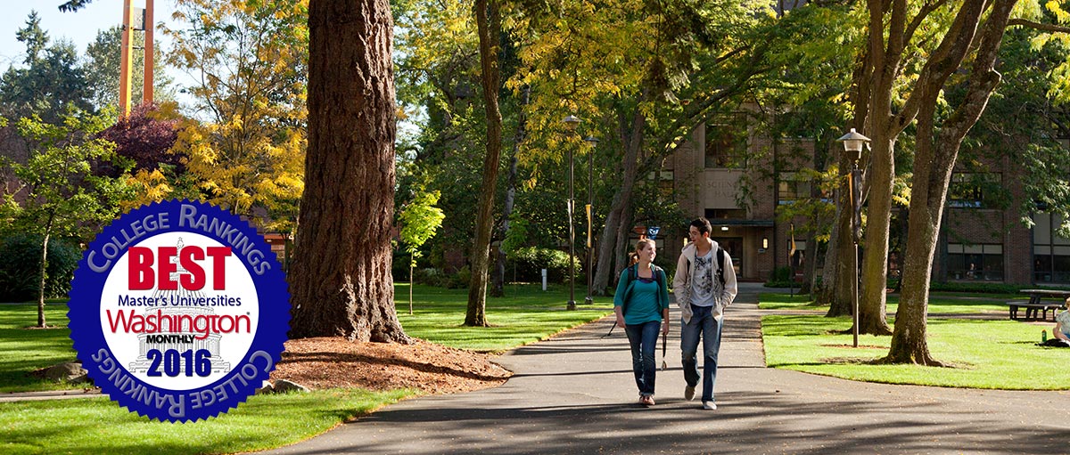 PLU students walk together on a sunny day on upper campus