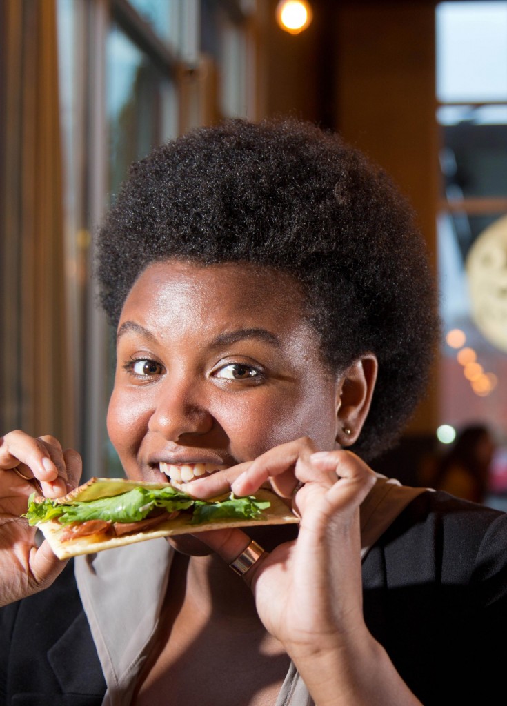 Brooke Thames takes a bite out of her piadini.