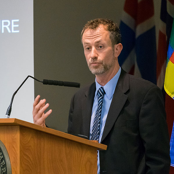 Stephen Mihm, associate professor of history from the University of Georgia, presented the Benson lecture