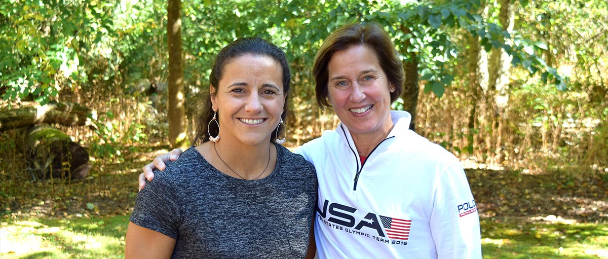 Cheryl Brost ’92 and PLU kinesiology professor Colleen Hacker on PLU's lower campus