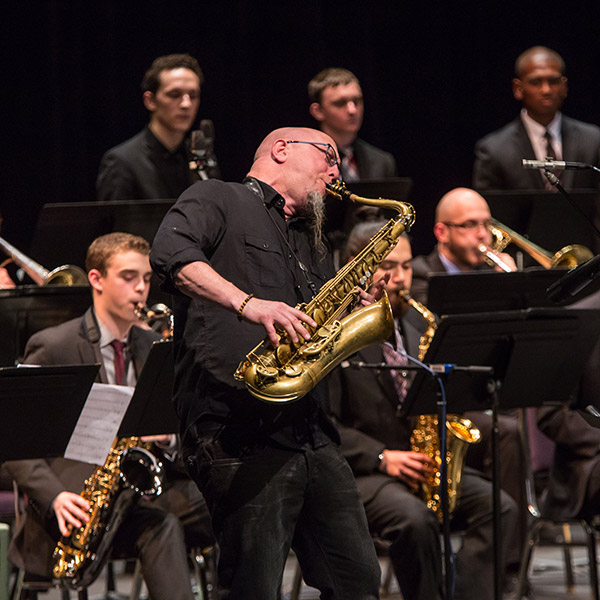 Jeff Coffin performing on stage at PLU