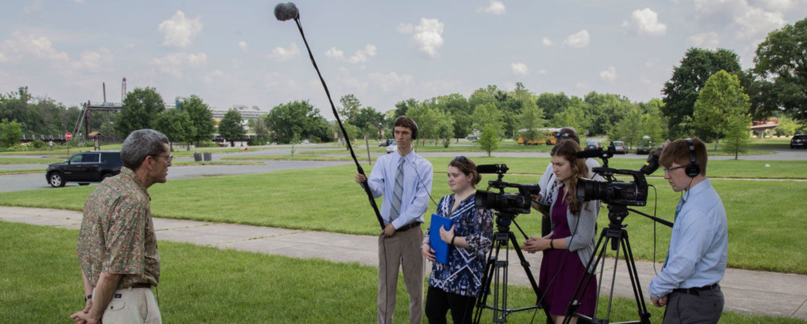 Carlton Haywood (far left), executive director of the Interstate Commission of the Potomac River Basin, is interviewed by MediaLab members (left to right) Joshua Wiersma ’17, Kelly Lavelle ’18, Rachel Lovrovich ’18 and Chris Boettcher ’17. (Photo by John Struzenberg, courtesy of MediaLab)