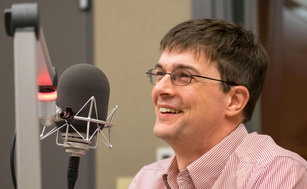 PLU Dean of Humanities Kevin O'Brien laughing while being interviewed in PLU's DCHAT podcast.