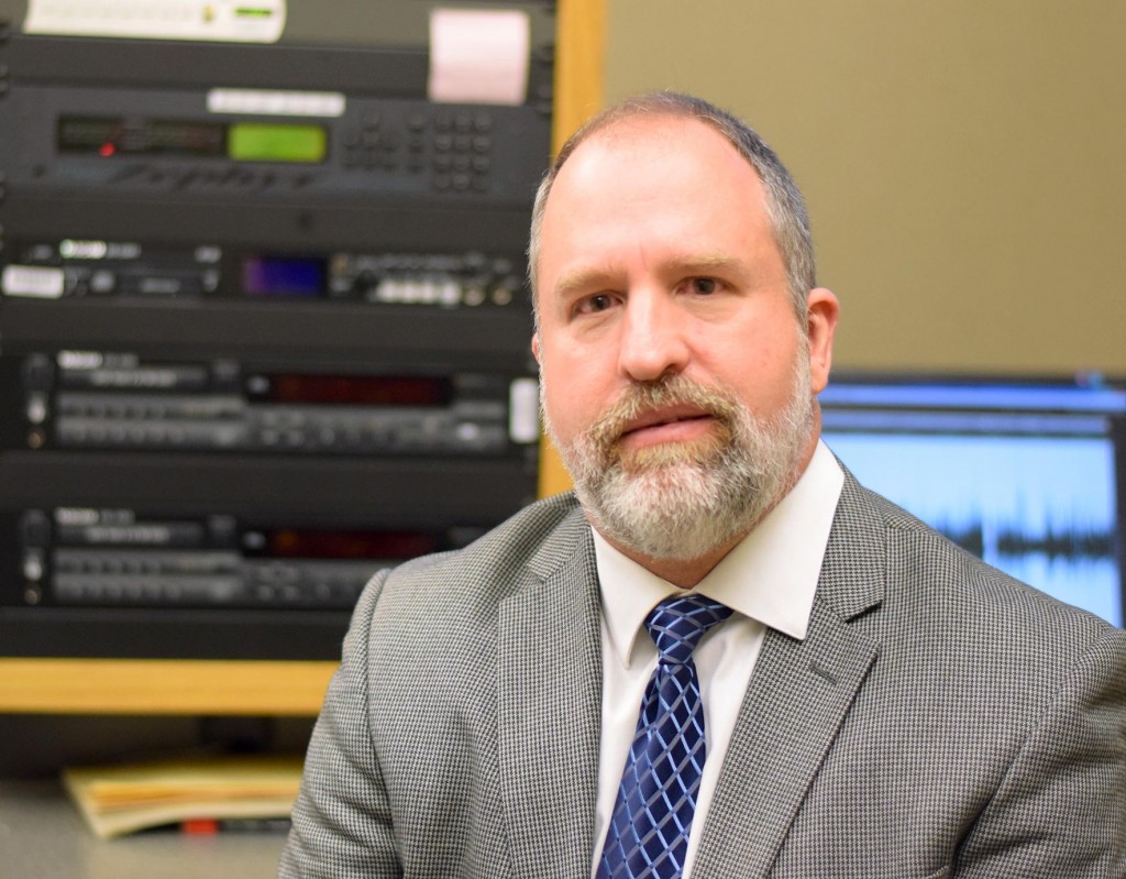 Matt-Smith-Main-Photo PLU dean of natural sciences Matt Smith in the KNKX studio on campus at PLU