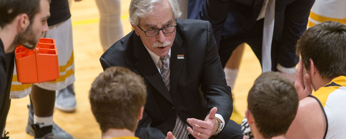 Coach Dickerson courtside