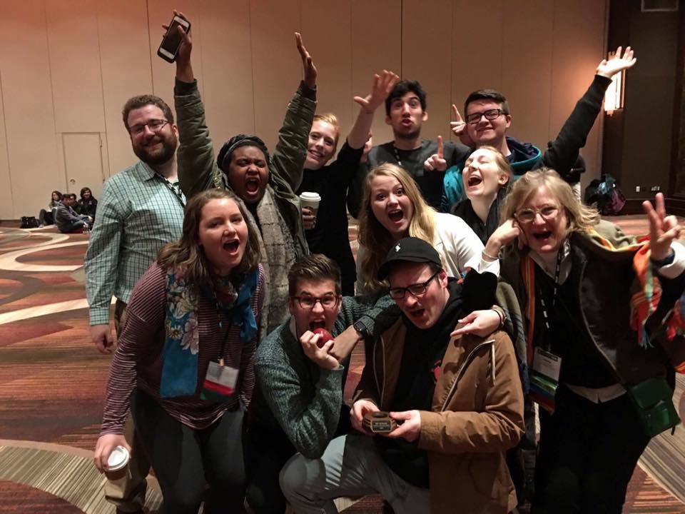 mastmedia Student media members celebrate after The Mast wins the Apple Award for best newspaper. (Photo courtesy of Mast Media)