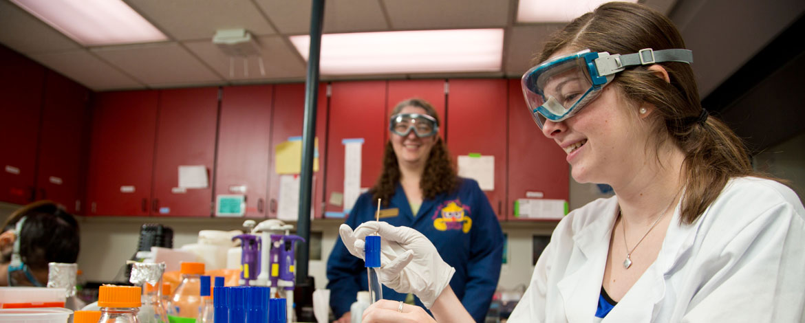 Mackenzie Deane and Associate Professor of Chemistry Tina Saxowsky work in a biology lab at PLU. (Photo/John Froschauer)