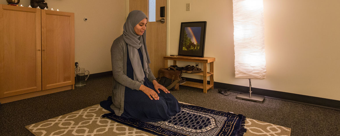 Alaa Alshaibani '17 praying in the new multifaith space on PLU's campus