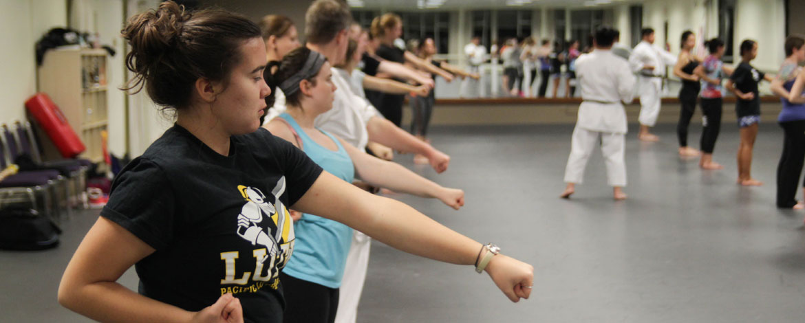 Lutes practice karate as part of five-week self-defense training, sponsored by the Karate Club, the Center for Gender Equity and Harstad Hall. (Photo by Oliver Johnson)