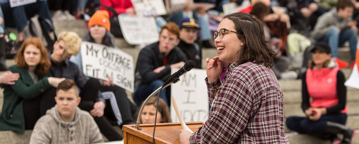 Gracie Anderson '21 speaks during a rally regarding gun violence on March 14 in Olympia. (Photo by John Froschauer/PLU)