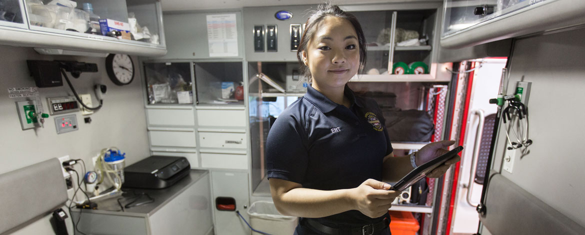 Sunny Huang '18 works a volunteer shift at Browns Point/Dash Point Fire Department, where she pulls 12-hour shifts as an emergency medical technician. (Photo by John Froschauer/PLU)