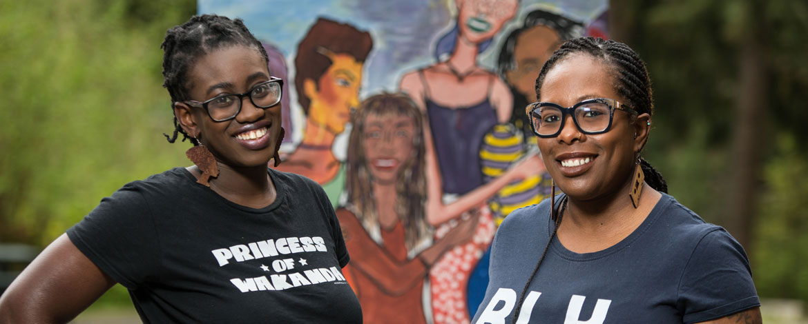 Tolu Taiwo (left), outreach and prevention coordinator, and Angie Hambrick, assistant vice president for diversity, justice and sustainability. (Photo by John Froschauer/PLU)