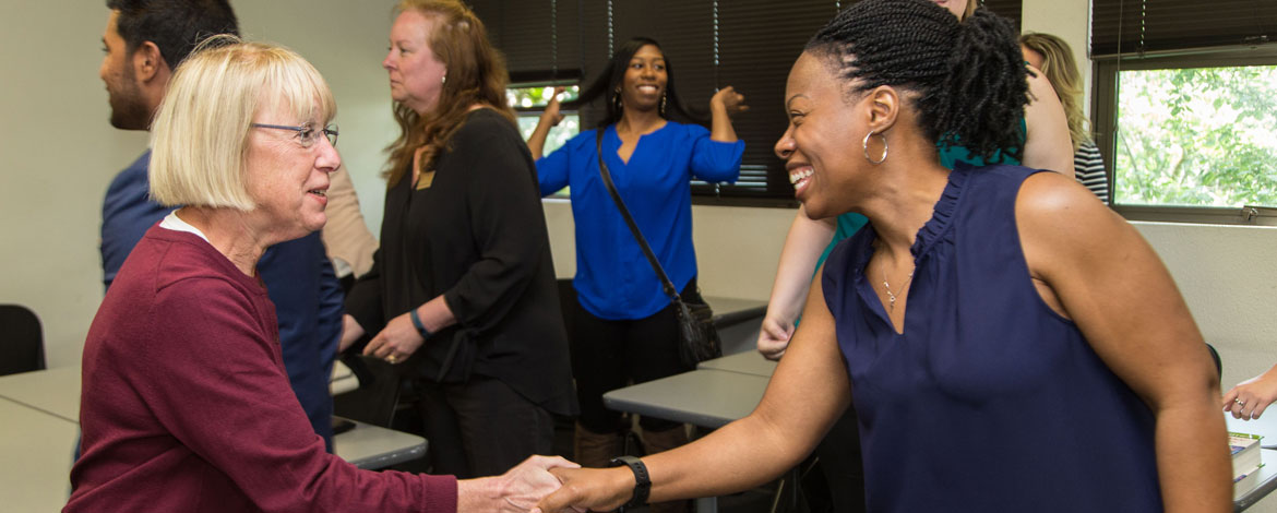 Sen. Patty Murray, D-Washington, greets Sylvia May '18, a recent graduate of the Doctor of Nursing Practice program at PLU. Murray toured campus, specifically the School of Nursing, on Wednesday, May 30. (Photo by John Froschauer/PLU)