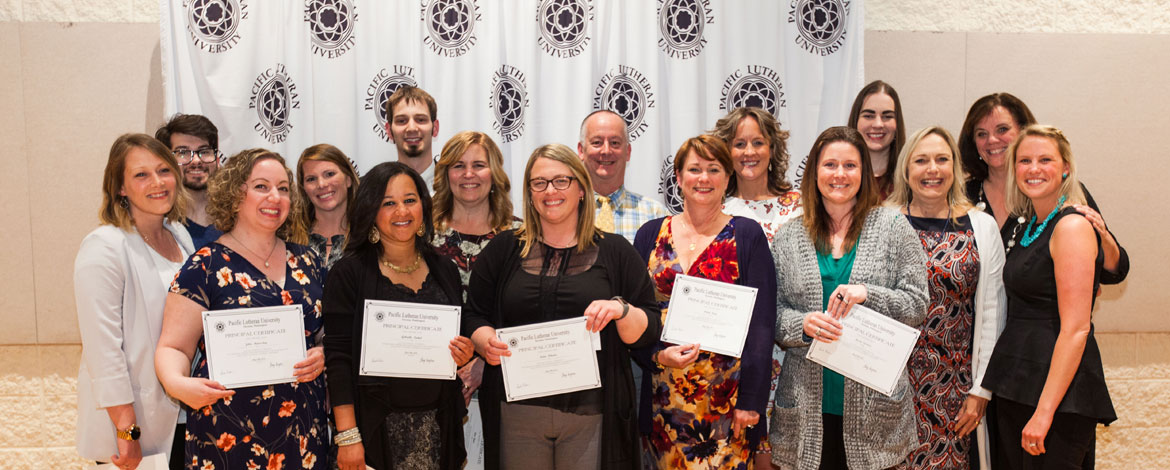 The cohort of graduating principals at the School of Education's Principal Intern Recognition Ceremony on Friday, May 18. (Photo by John Froschauer/PLU)